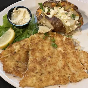 Calamari Steak with loaded baked potato.