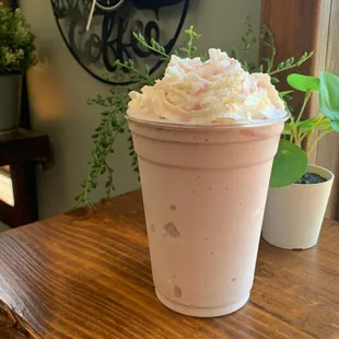 a cup of coffee on a table