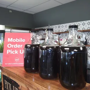 a row of jars of pick up coffee