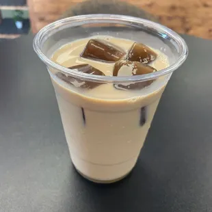 a cup of coffee on a table