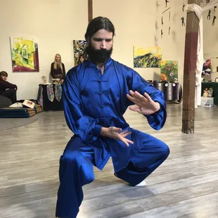 Matt Branstetter provides a Tai Chi demonstration during an art fair