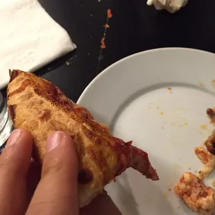 Long blonde hair baked into my pizza!