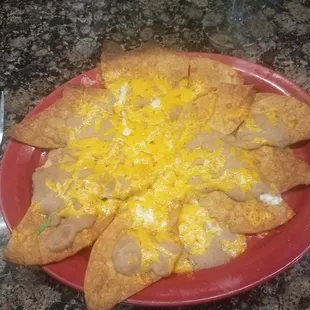 Original order of nachos sent back.