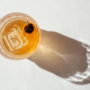 a shot of a drink in a plastic cup