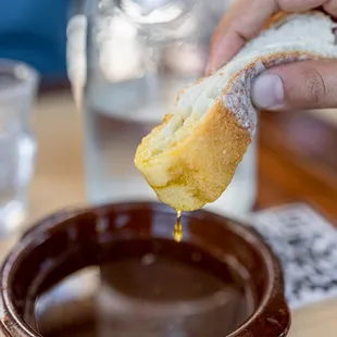 Complimentary fresh bread and oil ($0)