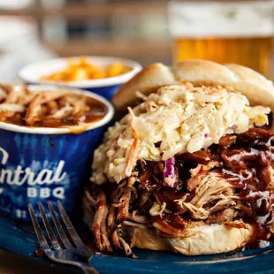 Pork sandwich with Cole slaw baked beans and Mac n Cheese