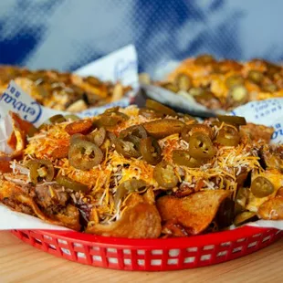 three baskets of food on a table