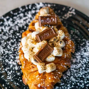 S'mores Croffle with flambéed marshmallows and Hershey's Chocolate.