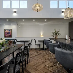 a dining room with a bar