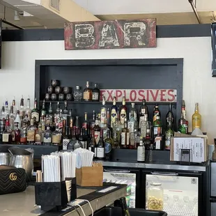 a bar with a variety of liquors