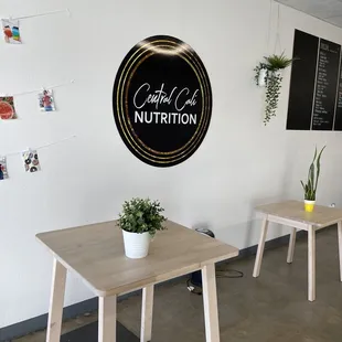 two tables and a plant