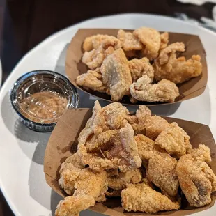 2 two orders of happy hour chicken cracklins with some extra seasoning on the side cuz I like it