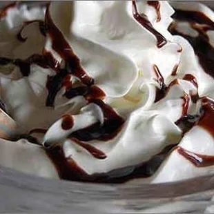 Milkshake with chocolate syrup.