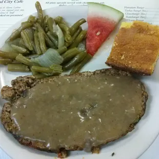 Meatloaf, gravy, green beans and cornbread.
