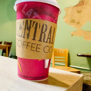a cup of coffee on a table