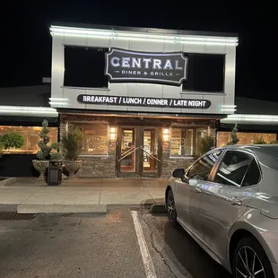 a car parked in front of the restaurant