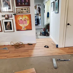 First pieces of Luxury Vinyl Plank going in!