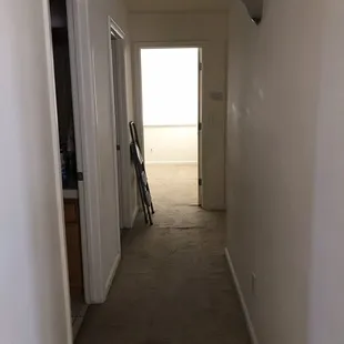 Before Yucky carpet in hallway