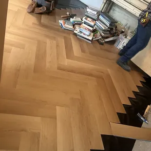 Gaia Red Series flooring installed with herringbone pattern. WOW!