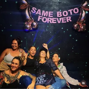 a group of women posing for a picture