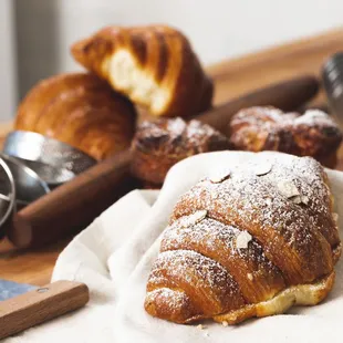 a croissant with powdered sugar