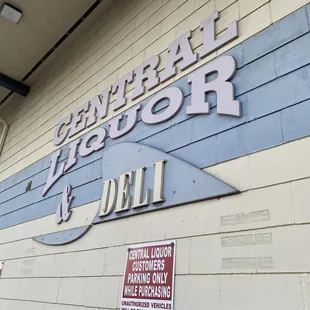 a sign on the side of a building