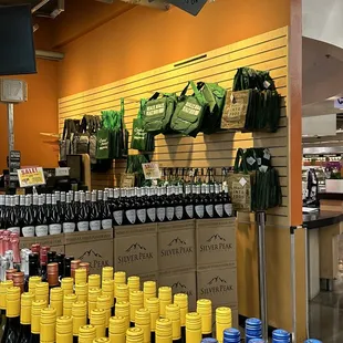 rows of bottles of wine on display