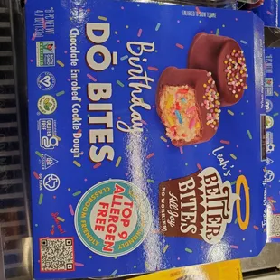 two boxes of donuts on display