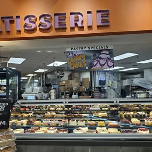 a variety of pastries in a display case