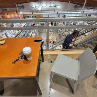 2nd floor mezzanine tables indoor/outdoor, have plenty of power outlets for devices. Dine above!