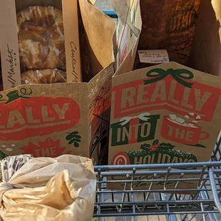 a carton of doughnuts and other pastries