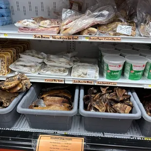 a display of a variety of meats