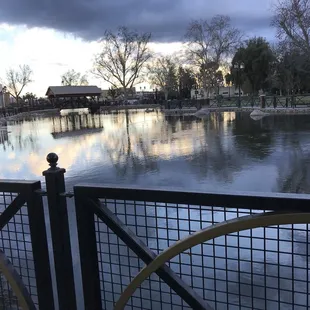 Pond with view of bridge
