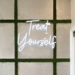 treat yourself neon sign