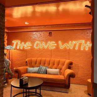 the one with neon sign