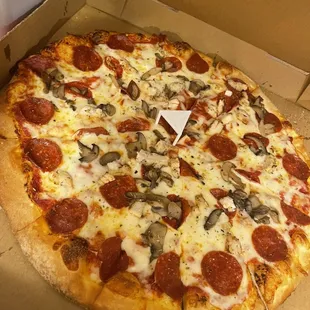 Pepperoni. Chicken. Mushrooms. Extra sauce