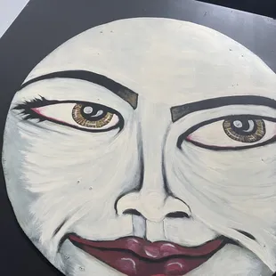 the face of a man in the moon
