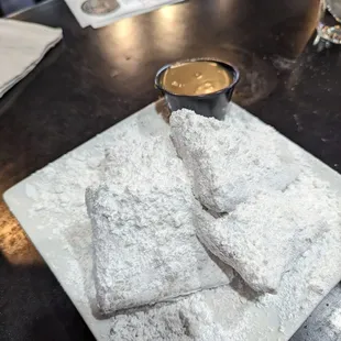 Beignets with WAY too much powdered sugar