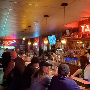 people sitting at the bar