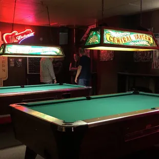 pool tables and neon signs