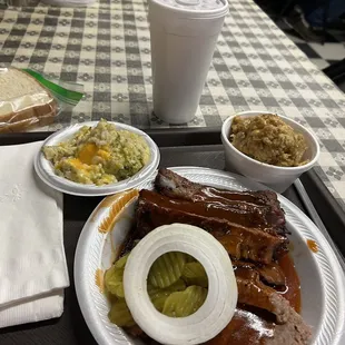 Ribs, brisket, Cornbread Dressing and Broccoli and Rice