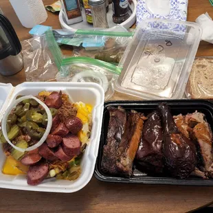 My loaded baked potato and 3-meat plate.