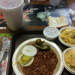 $11.99 Lunch Special - Chopped BBQ meat and 2 sides of Loaded Mashed Potatoes. Less work than a loaded baked potato.