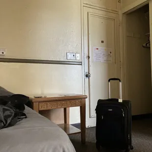 Room is big but outdated. Bring air freshener or filter system.