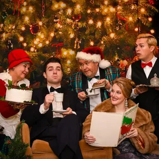 a group of people dressed up for christmas