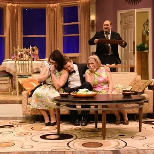a group of people sitting on a couch