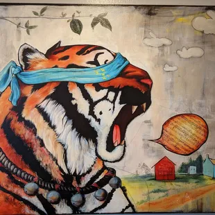 a painting of a tiger with a blue bandana