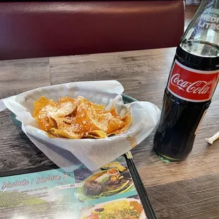 Complimentary chips and my $5 soda