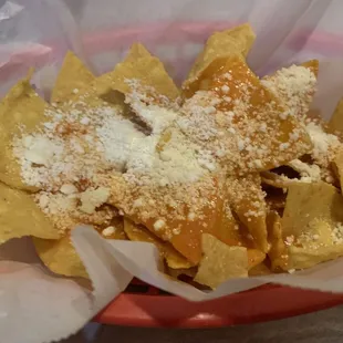 So nice that the lady gave us chips with a nice sauce &amp; Queso Freso Cheese on top, while we wait for our take out order. Yum!