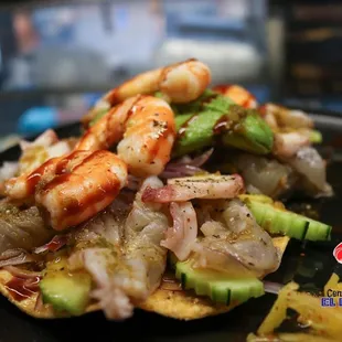 Tostada culichi 
Shrimp,octopus and aguachile